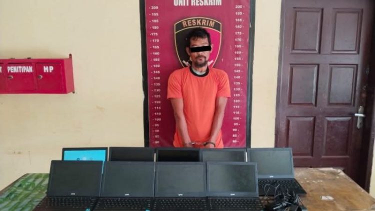 Pencuri 13 laptop di smp nu deli serdang diringkus, sebagian barang dijual di medan tersangka.